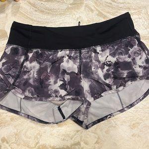 Good condition shorts with cool, rose pattern